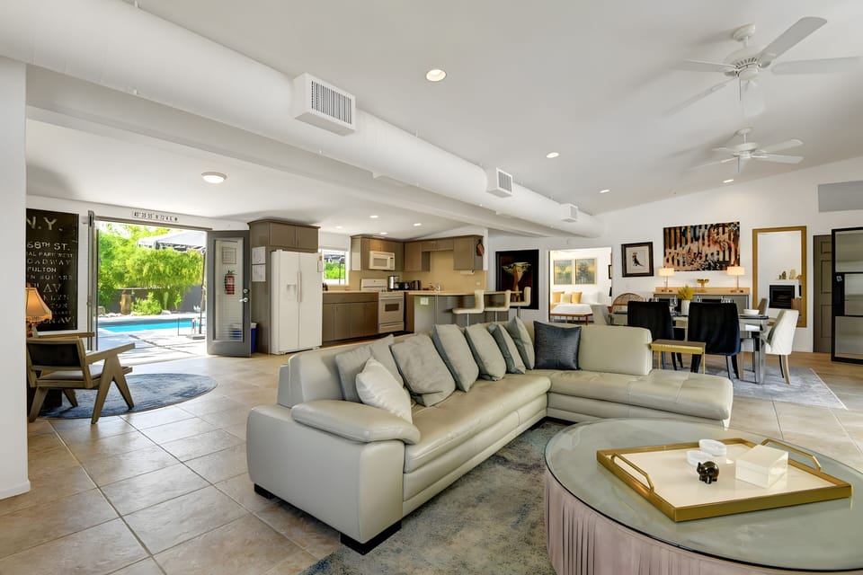 Open-concept interior with large doors for fresh air.