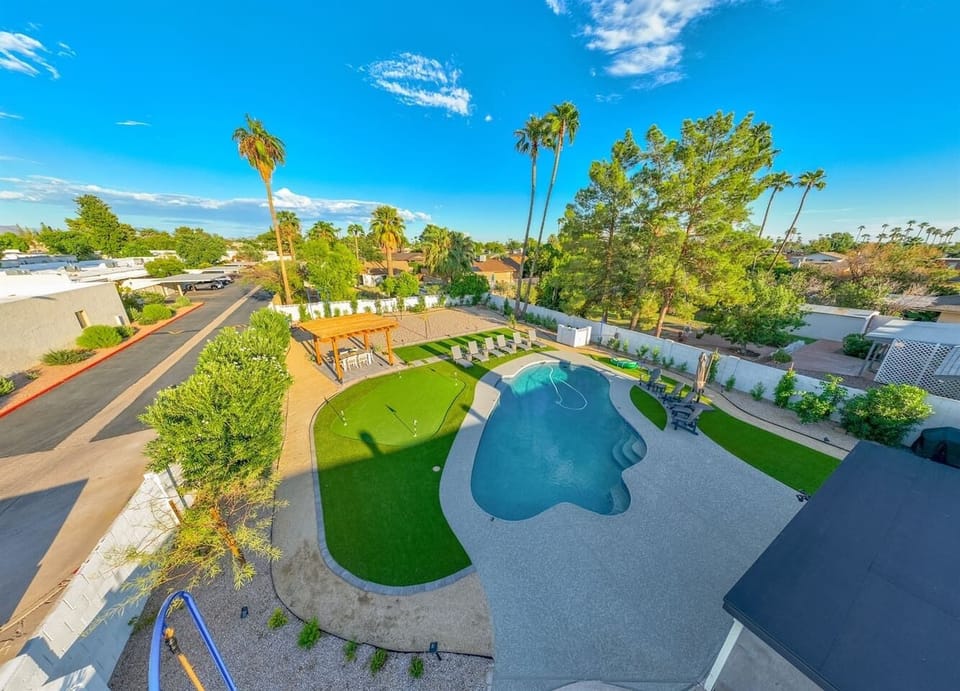 This expansive backyard offers something for everyone, making it the perfect setting for outdoor gatherings and adventures.