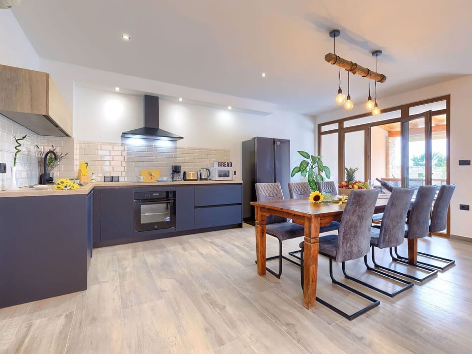 Furniture, Cabinetry, Countertop, Chair, Wood, Table, Interior Design, Houseplant, Building, Floor