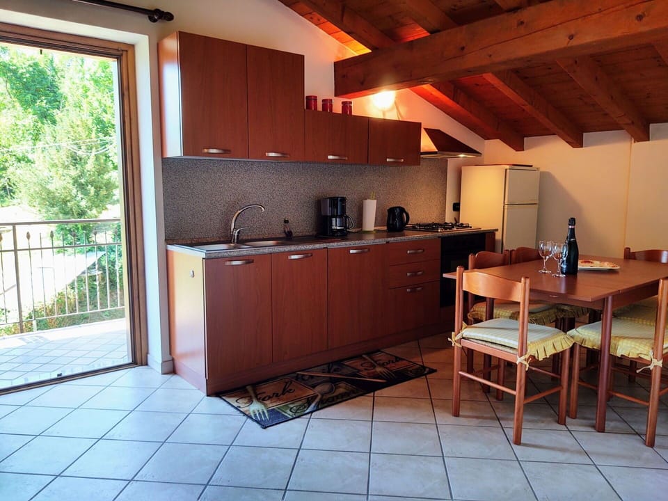 Cabinetry, Furniture, Property, Table, Wood, Countertop, Interior Design, Flooring, Kitchen, Plant