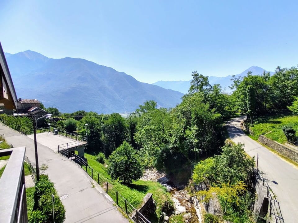 Sky, Plant, Mountain, Tree, Road Surface, Highland, Slope, Urban Design, Leisure