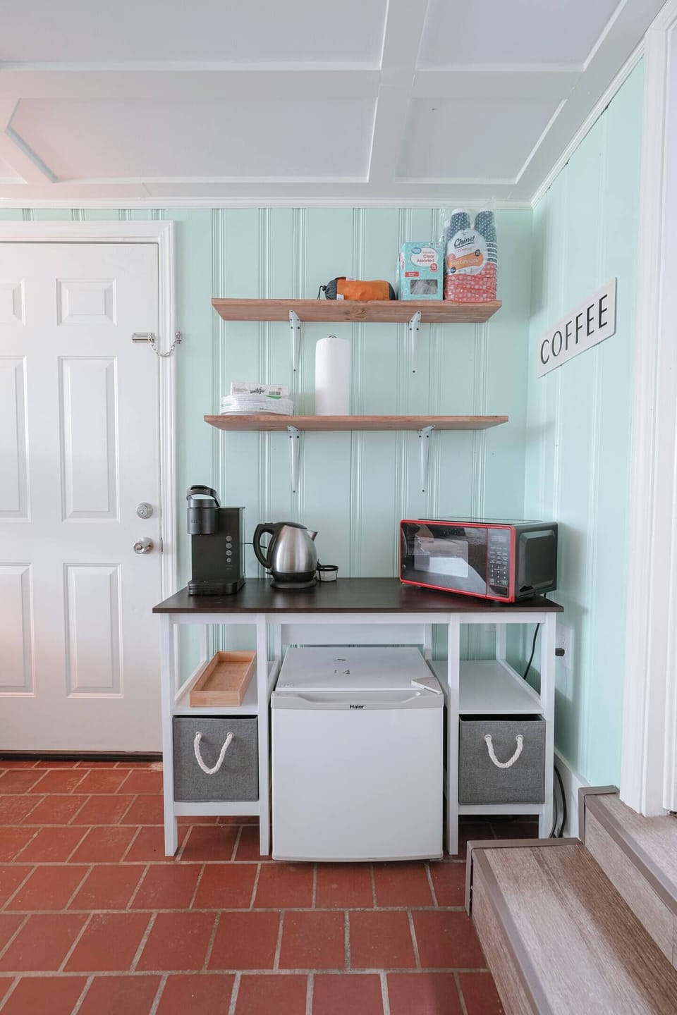 The coffee station always stocked with k-cups, creamer, and sugar