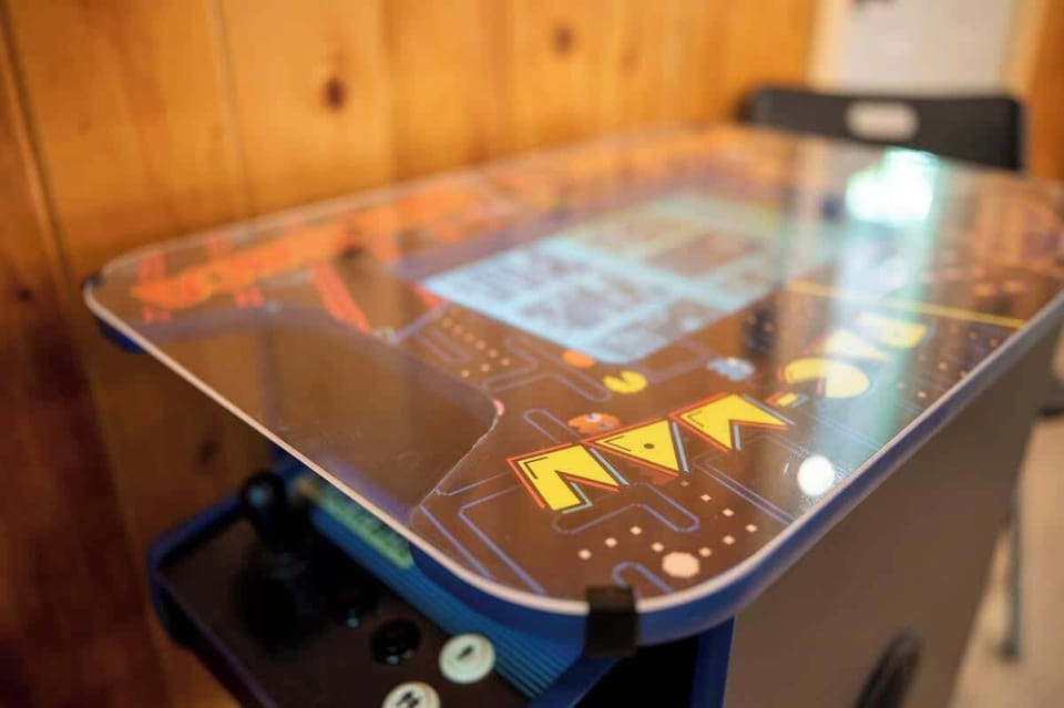 Classic Pac-Man arcade game for a fun throwback experience—perfect for rainy days or friendly competition.