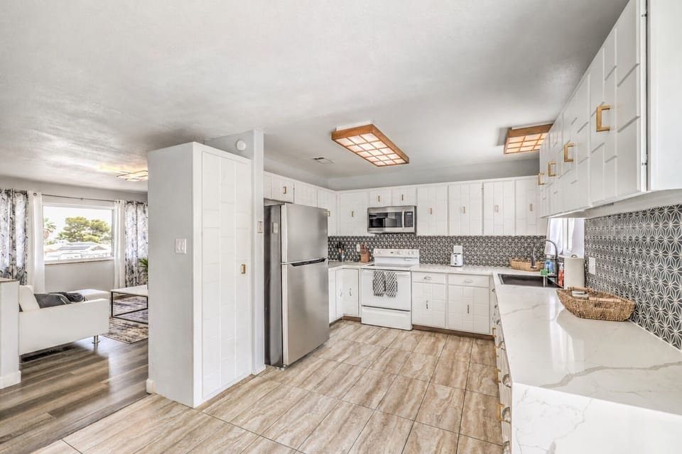 Kitchen: Modern design meets functionality with stylish accents and ample space for culinary adventures!