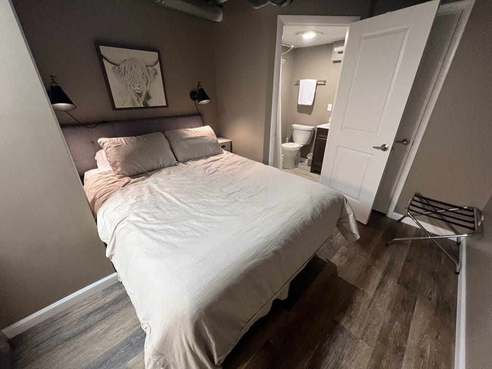 Queen bedroom in basement with en-suite bathroom 