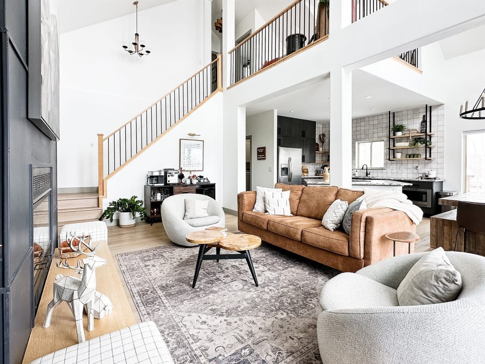 Relax in modern comfort in our cozy living room, gas fireplace and caffeination station that spans all generations level of happiness.