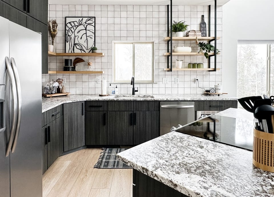 Sleek, chic, and ready to impress: Unleash your culinary creativity in our kitchen, adorned with beautiful melamine cabinetry and luxe leathered granite.