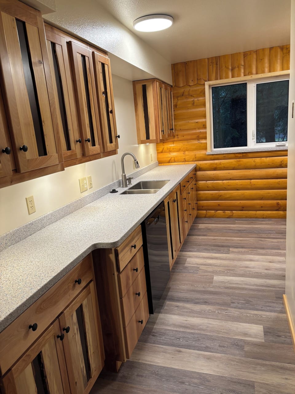Kitchen. stocked with plenty of dishes, glassware, pots & pans.