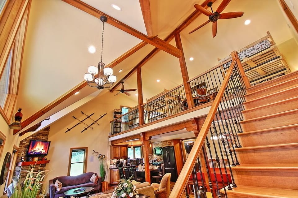 View of loft from lower level- beautiful woodwork! 