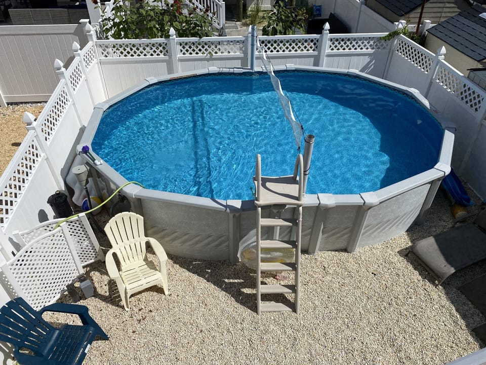 Outdoor pool, 3 lounge chairs.