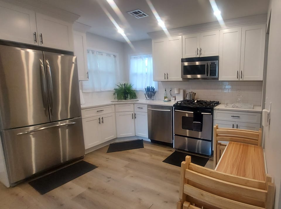 Fully equipped kitchen  with stainless steel appliances, dishes, silverware,etc
