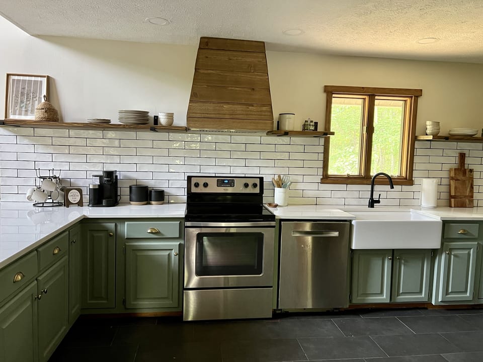 Newly remodeled farm house kitchen, and custom cedar hood 