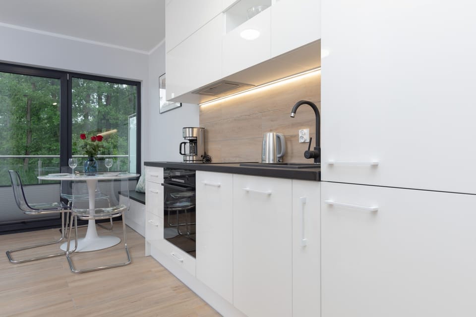 The fully equipped kitchenette includes everything you need for a home-cooked meal.