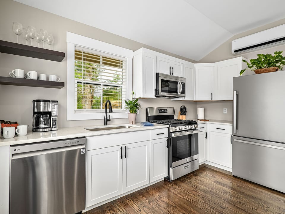 The kitchen with all appliances shown
