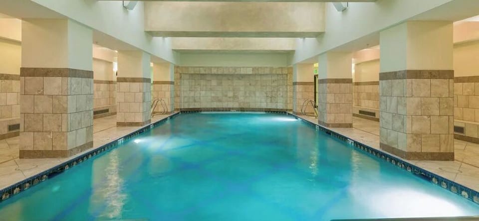 Adult-specific indoor swimming pool with hottub, dry and wet saunas, waterfall