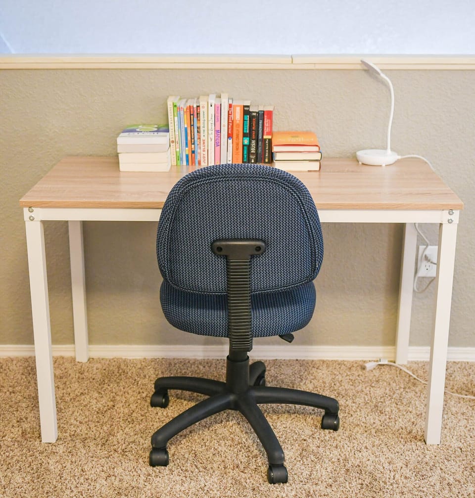 Comfortable work space with books for the family.