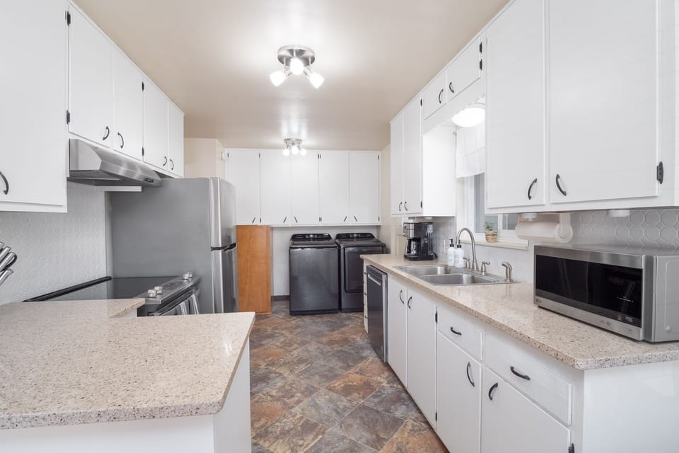 Your updated galley kitchen is fully stocked with all your cooking essentialls.