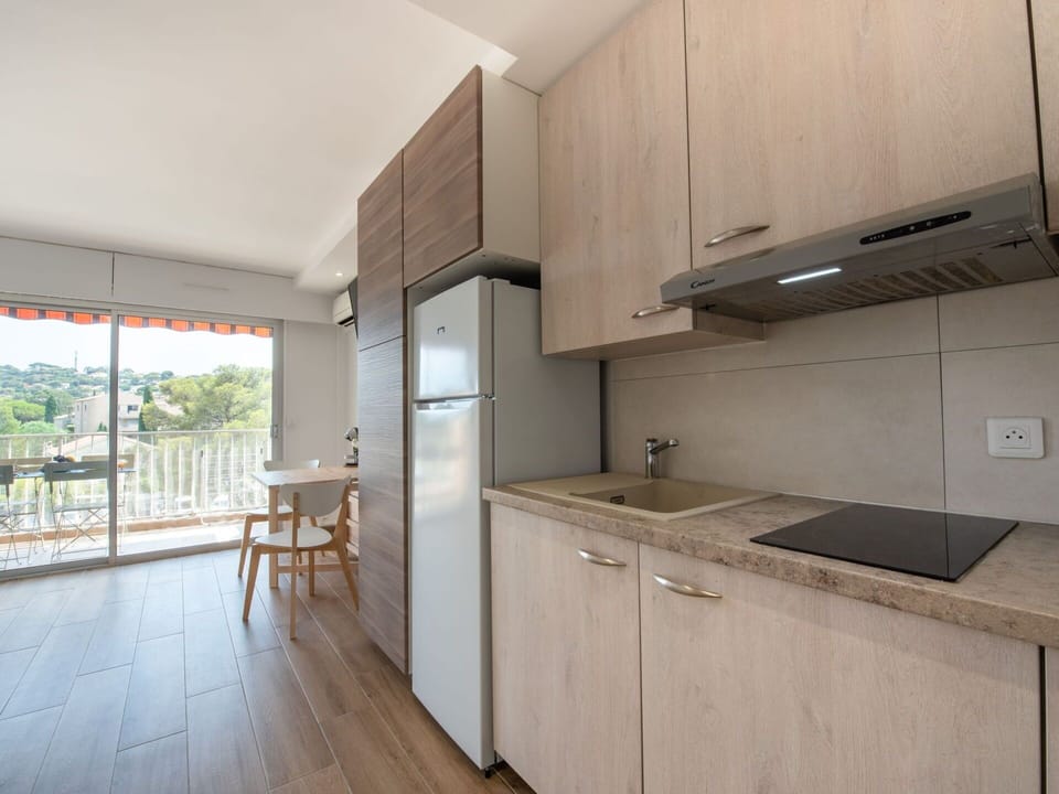 Cabinetry, Property, Countertop, Furniture, Kitchen Appliance, Kitchen Stove, Kitchen, Wood, Lighting, Architecture