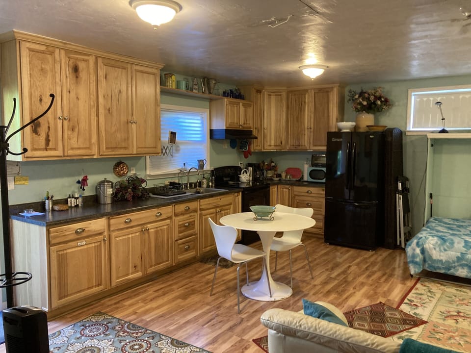 A full kitchen with all tools!  And dining table