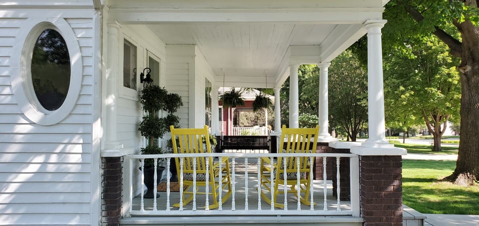 Charming Front Porch with 2 Comfy Rocking Chairs and Porch Swing