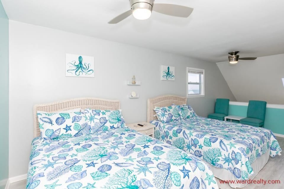 Loft bedroom with 2 queen beds and private bath