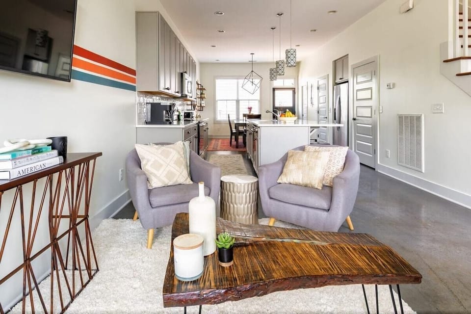 The open layout offers unobstructed sightlines from the living room through to the kitchen and dining area.