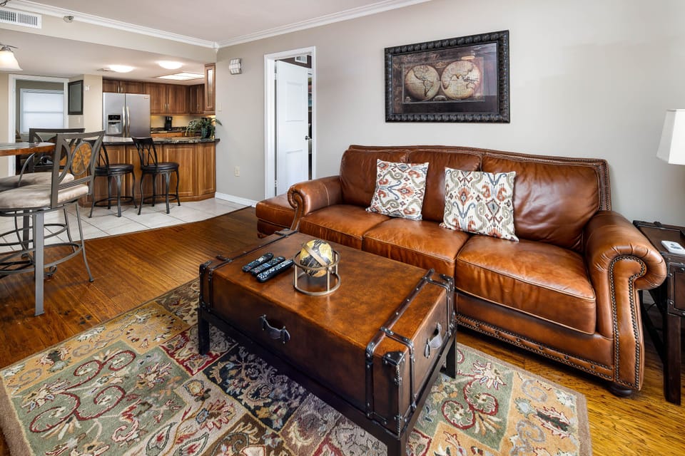 Living room open to dining and kitchen