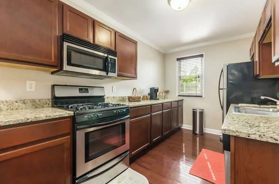 Plenty of cabinet space loaded with dishes, pots, pans, etc.