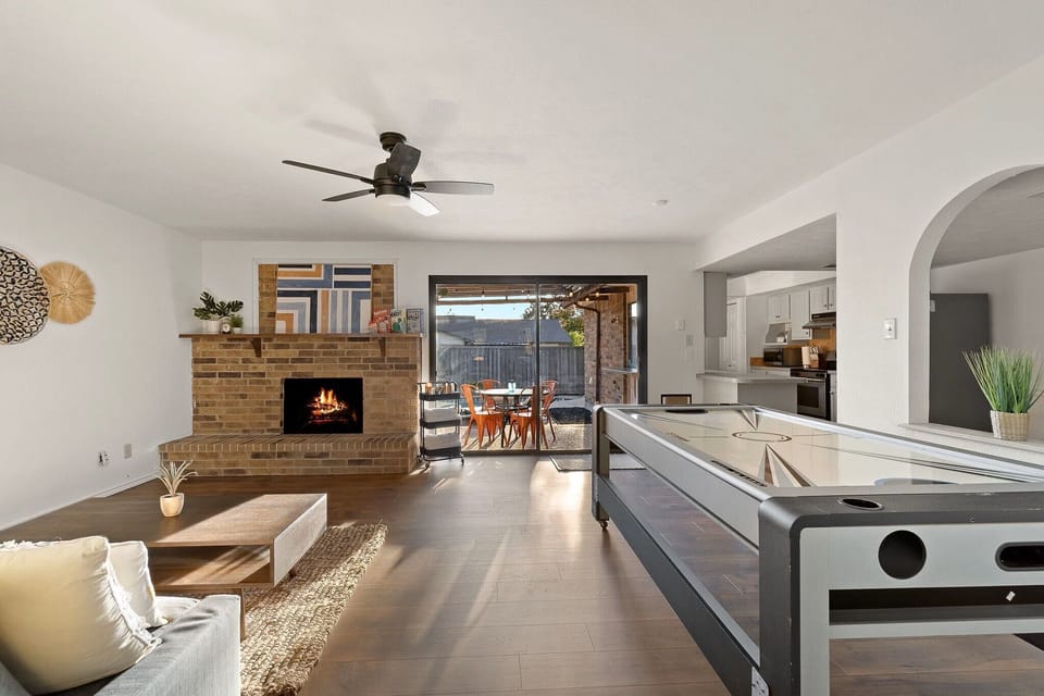 Charming living area with a beautiful fireplace, creating a warm and inviting atmosphere.