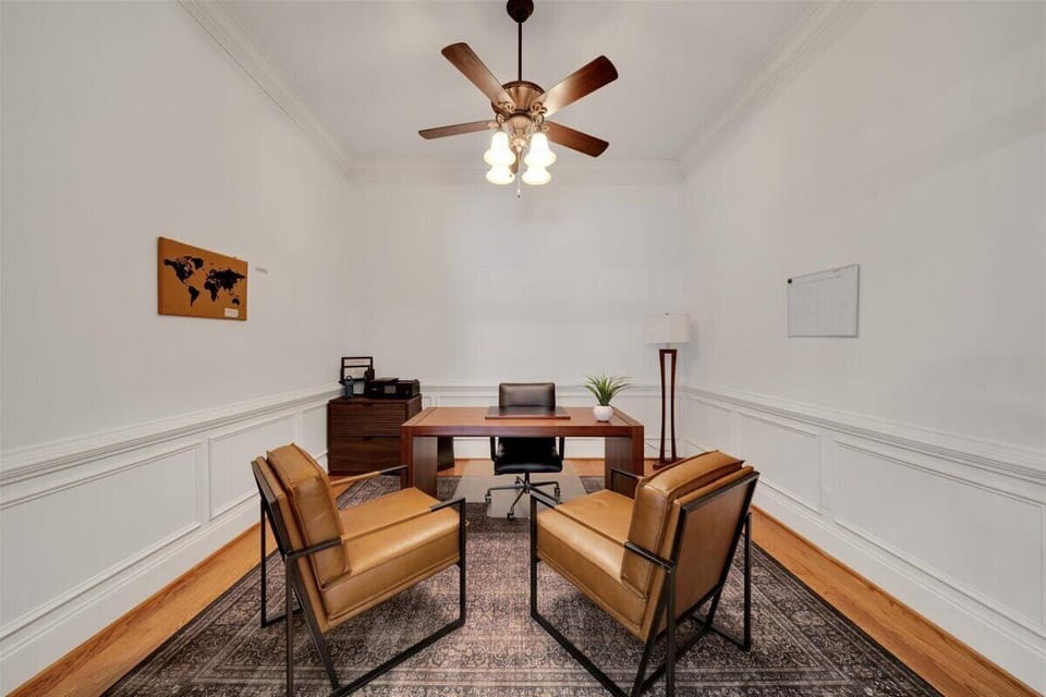 Private office with large desk and comfortable desk chair.