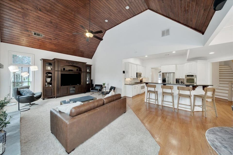 The open concept allows large families to socialize while cooking, relaxing, and playing games.