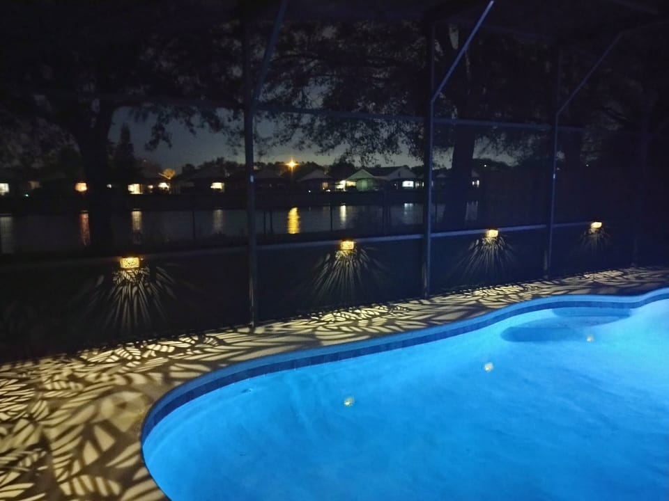 Reflections off the lake along with a color changing LED lit pool. 