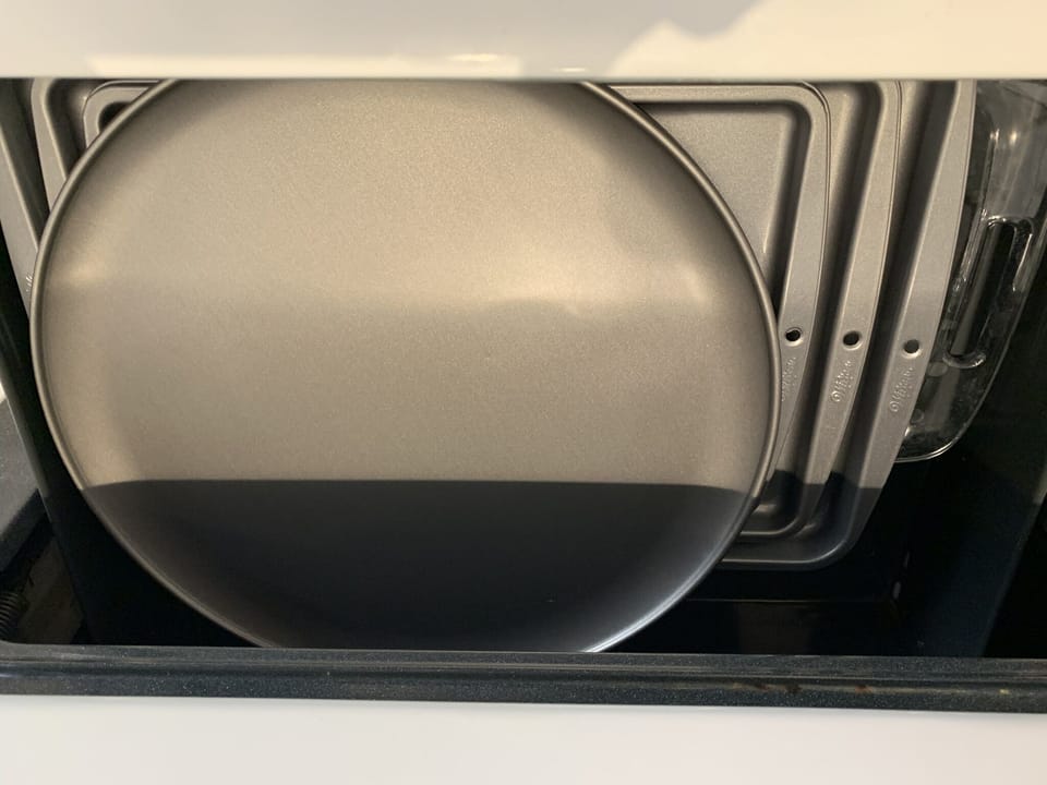 Trays for cookies, pyrex dishes, and a pizza pan!