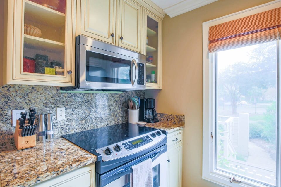 The well stocked kitchen also has a drip coffee maker.