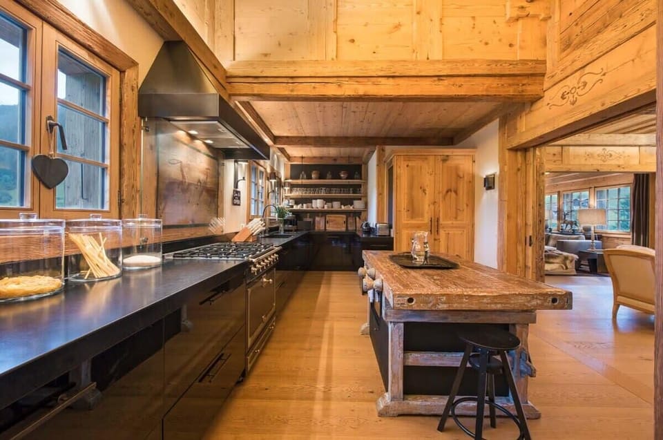 the professional kitchen with two kitchen tables 