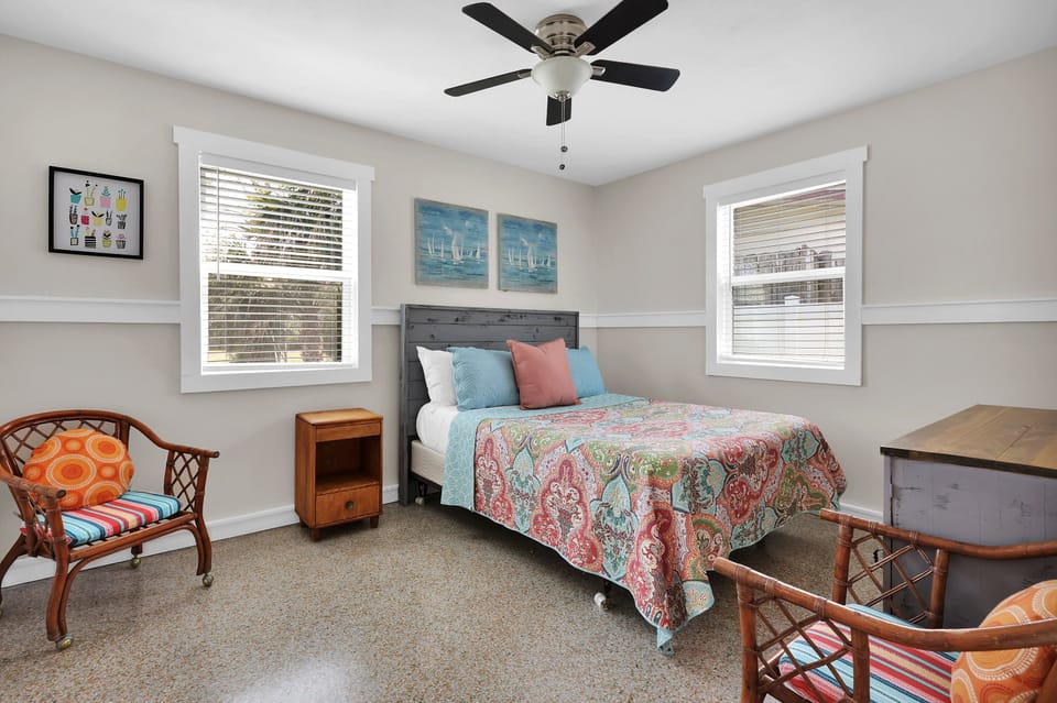 This send bedroom has an amazing queen size bed with a lot of cheer! It's hard not to make you smile.