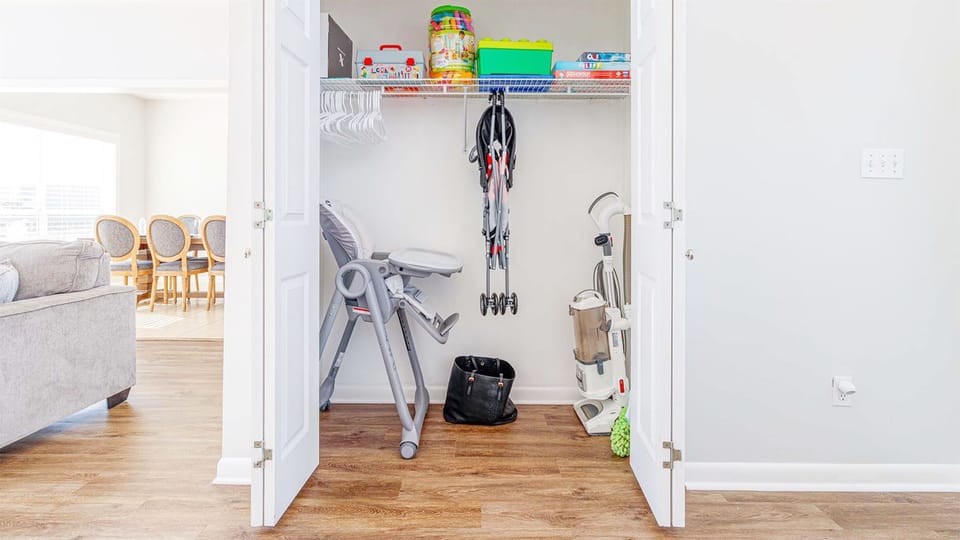 Storage Room inside the property, with a highchair and a pack n play for your little ones