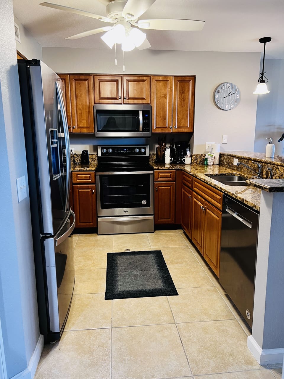 Your fully equipped kitchen awaits with granite counters, stainless appliances, and everything you need to create memorable meals together.