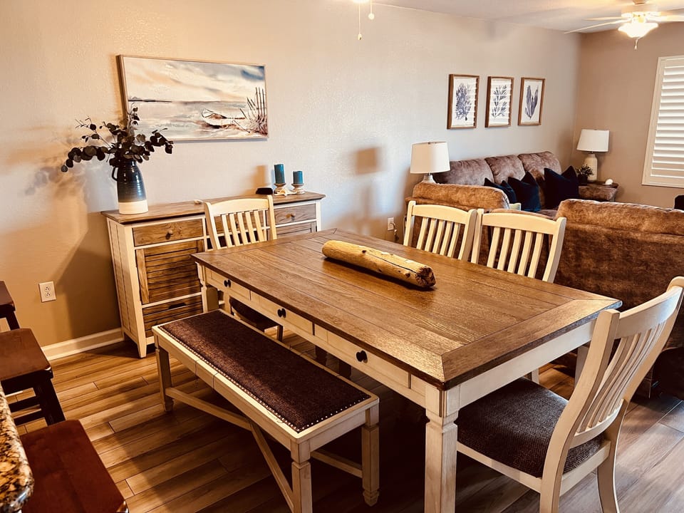 Gather around your beautiful dining table for memorable meals and conversations in this warm, thoughtfully decorated space.