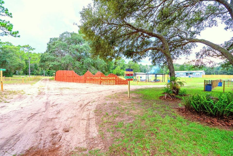 The Moto Ranch at Croom Vacation rentals main gate entrance 5 acres of private property inside Croom motorcycle area