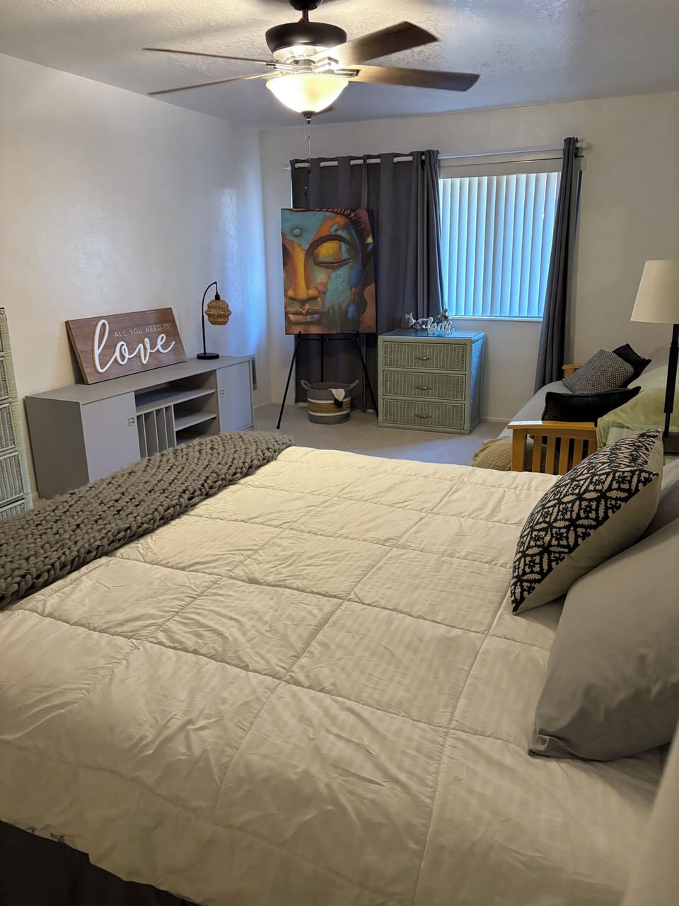 Primary room with king bed and daybed