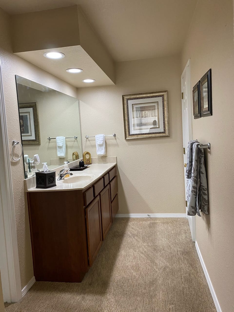 Separate vanity and walk in closet in the master suite 