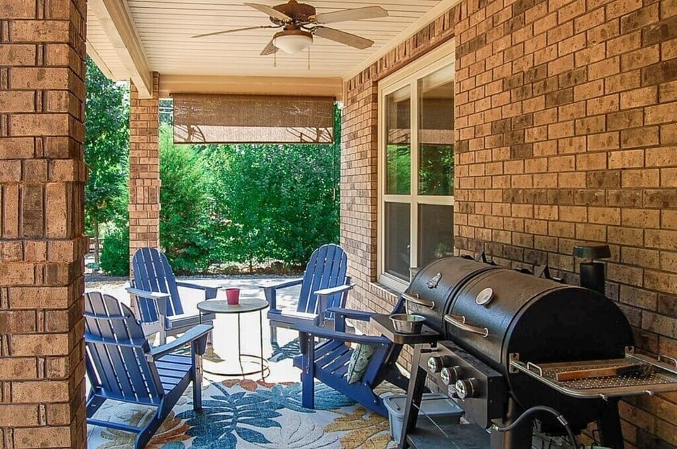 Large Grill and Lounging Area on Back Patio