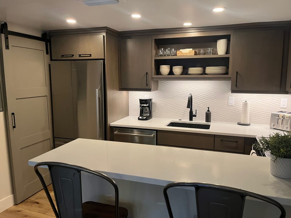 KITCHEN IS WELL STOCKED WITH ALL THE GADGETS YOU MIGHT NEED