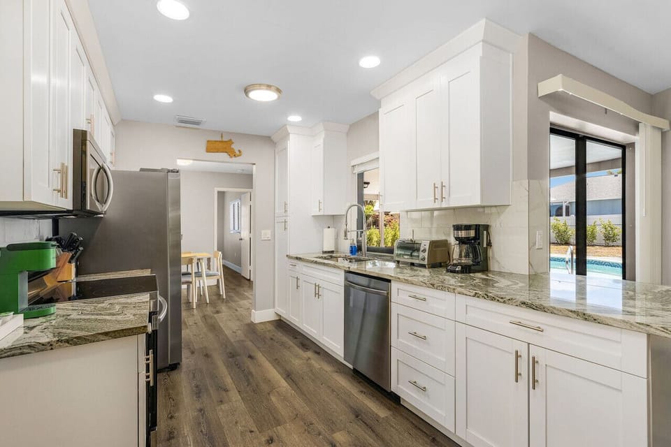 Plenty of small appliances in the kitchen
