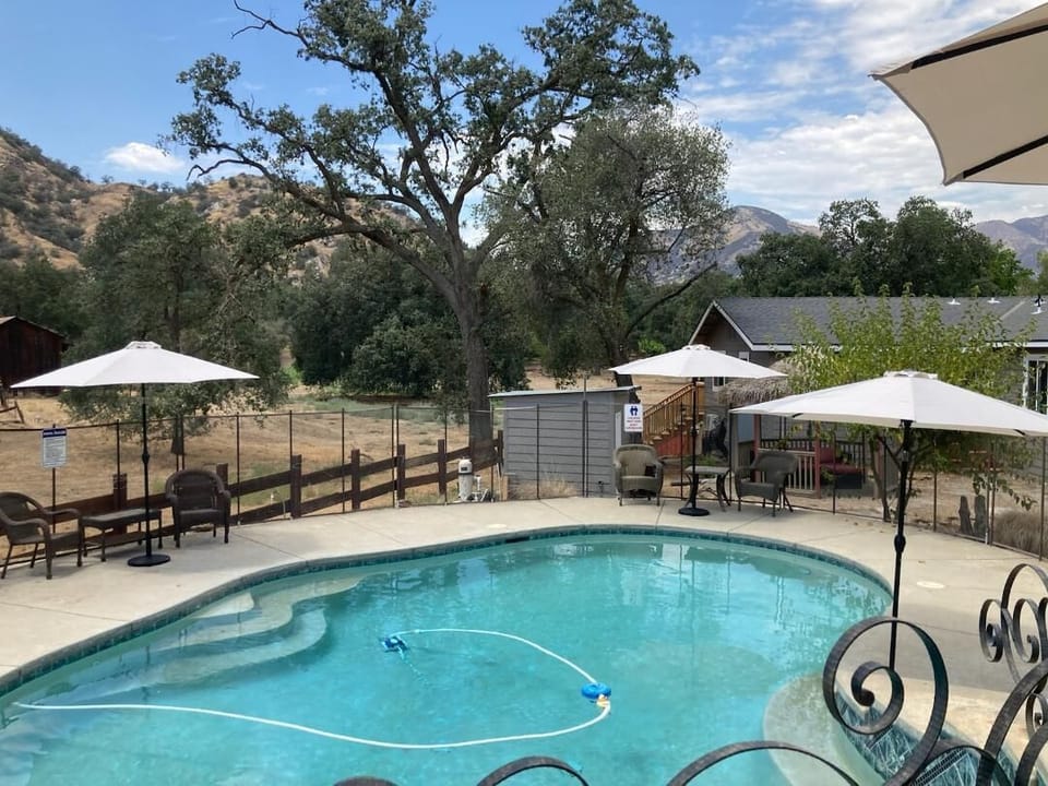 Cool off in the pool, then soak it all in after dark.