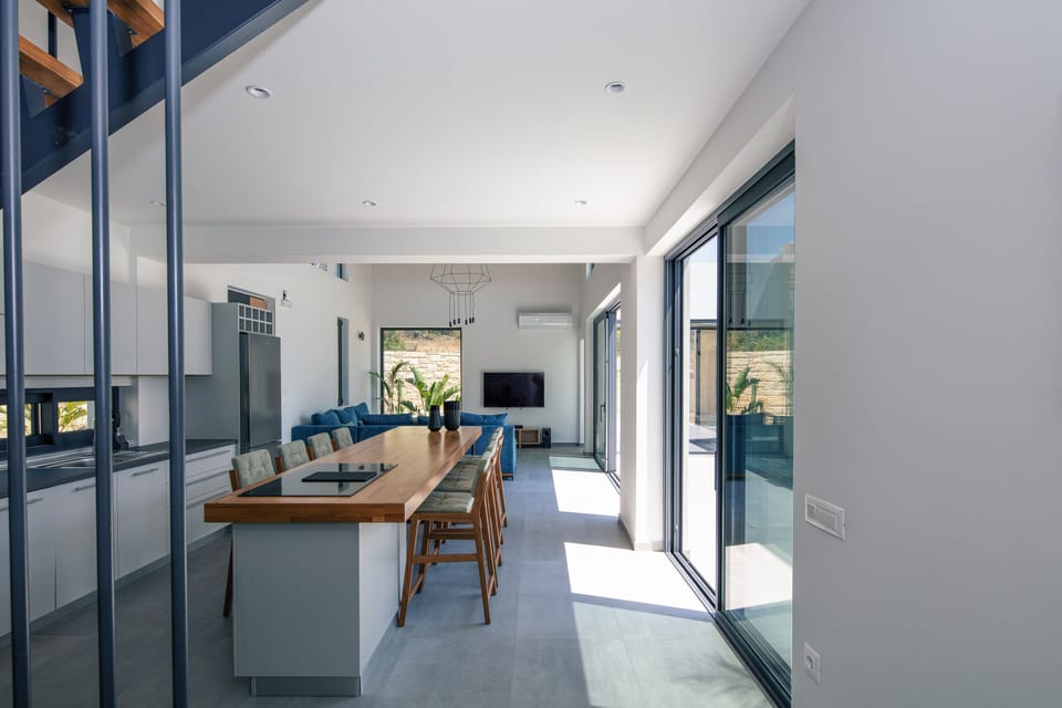 Spacious dining setup for 8, perfect for sharing meals together.