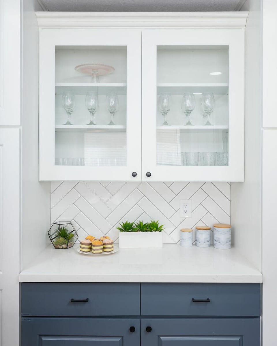 Open concept kitchen with stainless steel appliances, breakfast bar island seating, tons of natural light, and fully stocked with your basic cooking essentials.
