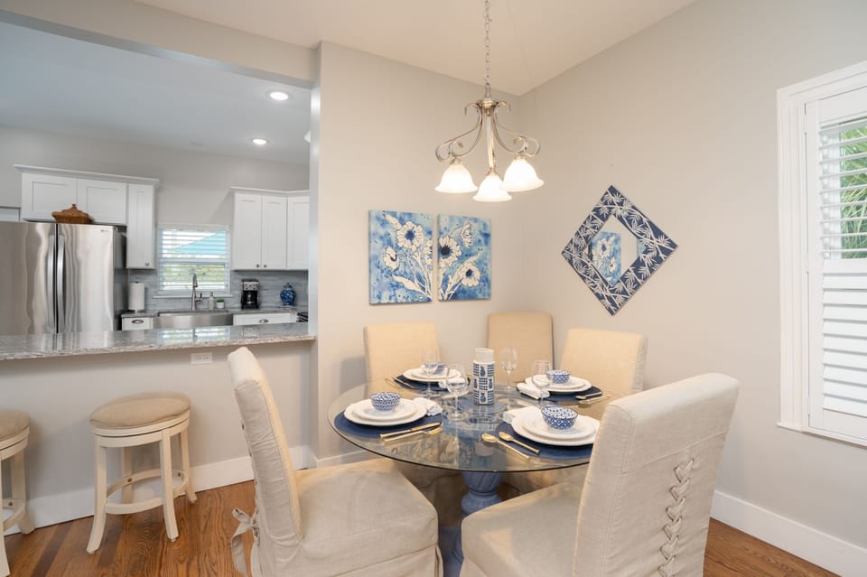The dining room with six chairs.