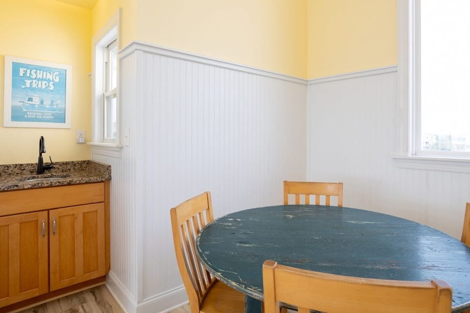 Puzzle table just off living room with wet bar - Puzzle table just off living room with wet bar